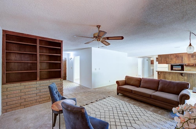 41151 Fig Grove Cir, Madera, CA 93636 - carpeted living area featuring ceiling fan and a textured ceiling