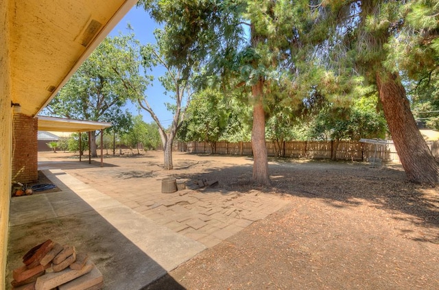 41151 Fig Grove Cir, Madera, CA 93636 - fenced backyard with a patio
