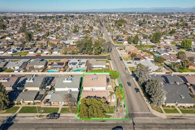 605 W Ashlan Ave, Clovis, CA 93612 - aerial overview of property's location with property boundaries highlighted and nearby suburban area
