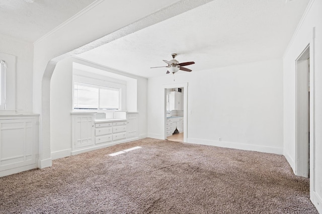3334 E Montecito Ave, Fresno, CA 93702 - unfurnished living room featuring carpet flooring, ceiling fan, crown molding, and a textured ceiling
