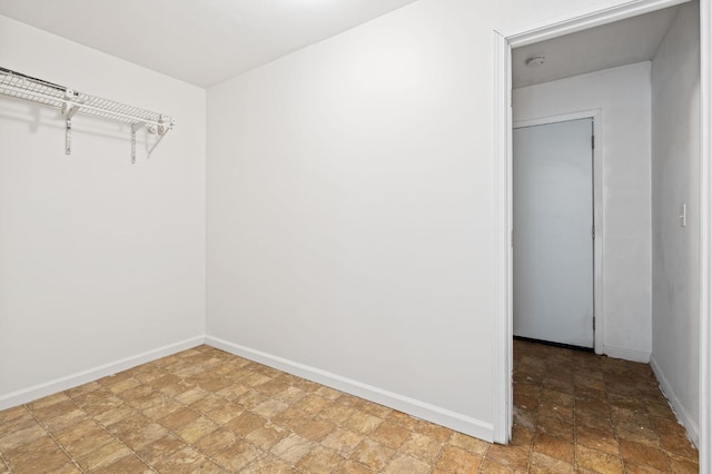 3334 E Montecito Ave, Fresno, CA 93702 - walk in closet with stone finish floors