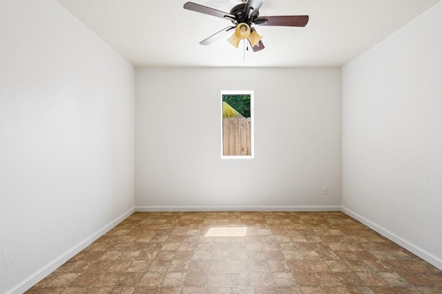 3334 E Montecito Ave, Fresno, CA 93702 - empty room featuring stone finish flooring and a ceiling fan