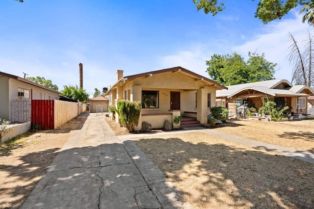 3334 E Montecito Ave, Fresno, CA 93702 - view of front facade featuring stucco siding and covered porch