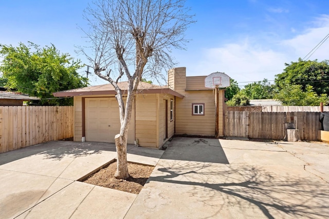 3334 E Montecito Ave, Fresno, CA 93702 - view of front of home featuring concrete driveway and a garage