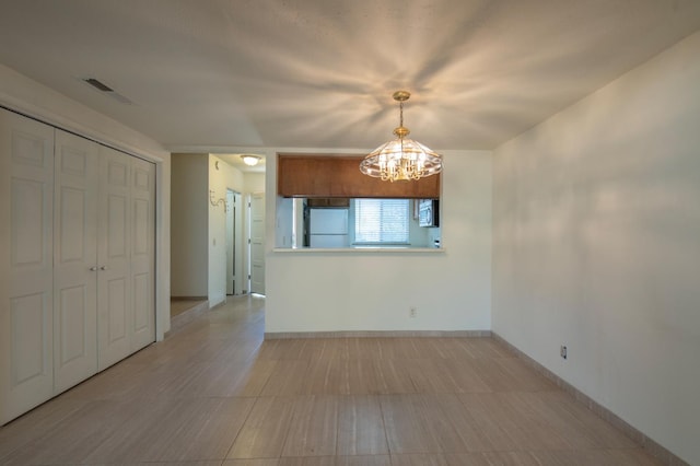 4875 N Backer Ave Unit 160, Fresno, CA 93726 - unfurnished living room featuring a chandelier and light wood-style floors