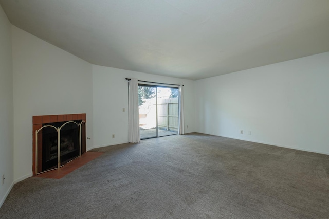 4875 N Backer Ave Unit 160, Fresno, CA 93726 - unfurnished living room featuring a tiled fireplace and carpet floors