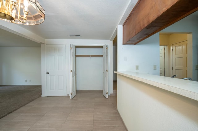 4875 N Backer Ave Unit 160, Fresno, CA 93726 - hall featuring a chandelier