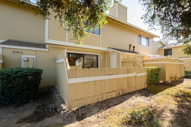 4875 N Backer Ave Unit 160, Fresno, CA 93726 - back of house featuring stucco siding
