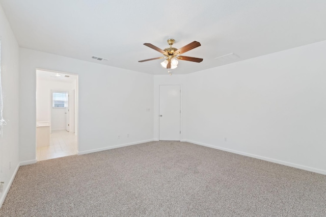 4220 Spruce St, Firebaugh, CA 93622 - spare room with a ceiling fan and carpet floors