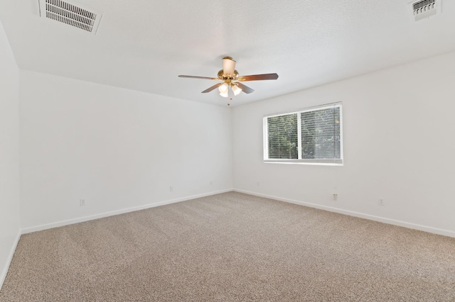 4220 Spruce St, Firebaugh, CA 93622 - carpeted spare room with a ceiling fan and baseboards