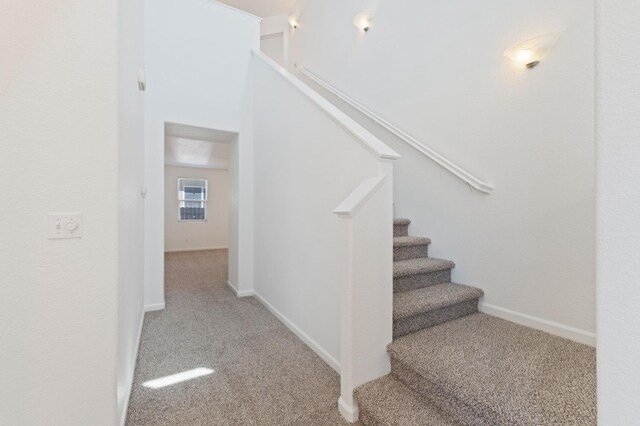 4220 Spruce St, Firebaugh, CA 93622 - staircase with carpet flooring and baseboards