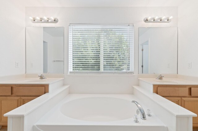 4220 Spruce St, Firebaugh, CA 93622 - bathroom with a garden tub and vanity