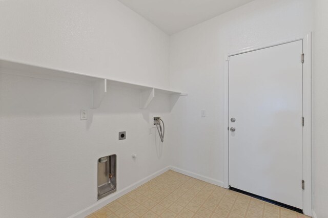 4220 Spruce St, Firebaugh, CA 93622 - laundry area featuring light flooring, electric dryer hookup, gas dryer hookup, and washer hookup
