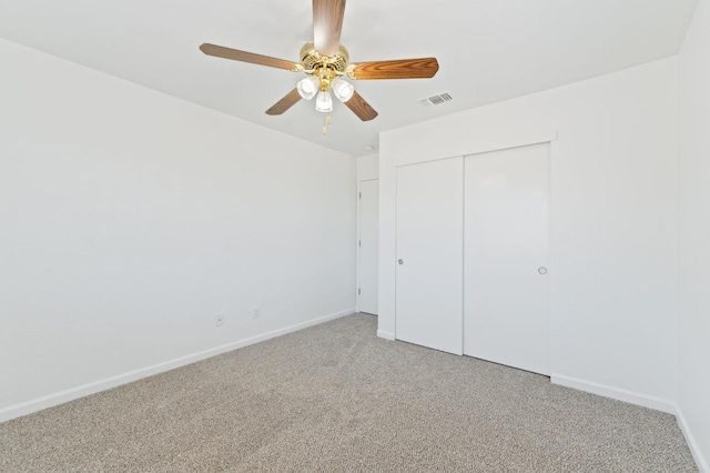 4220 Spruce St, Firebaugh, CA 93622 - unfurnished bedroom featuring light carpet, a closet, and a ceiling fan