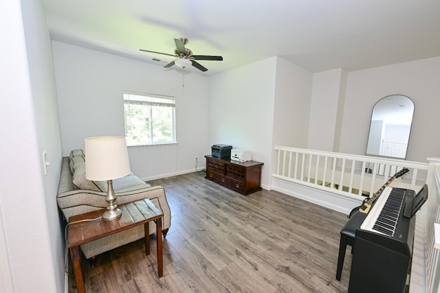 1082 E Oakmont, Fresno, CA 93730 - sitting room with wood finished floors and a ceiling fan