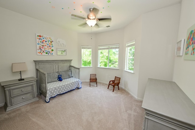 1082 E Oakmont, Fresno, CA 93730 - bedroom with light carpet and a ceiling fan
