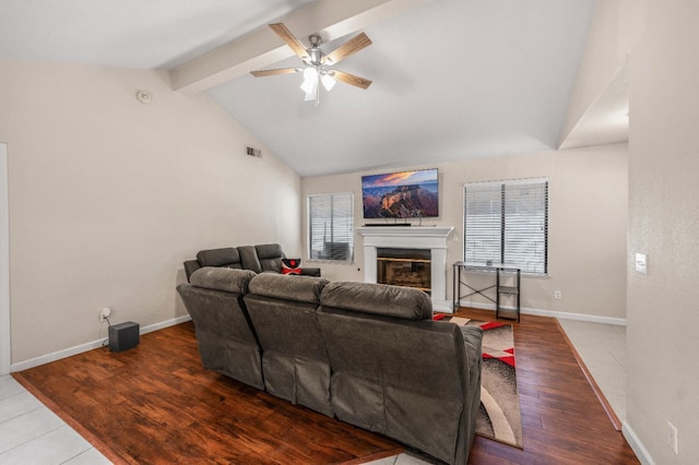 115 Prince Ln, Madera, CA 93637 - living room with a glass covered fireplace, ceiling fan, healthy amount of natural light, and wood finished floors
