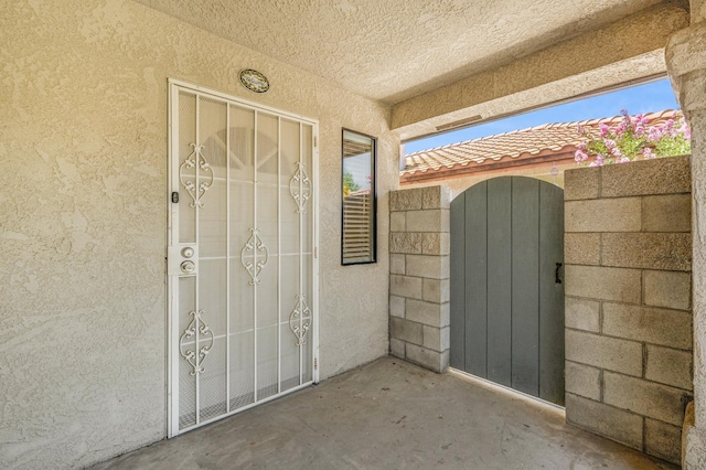 115 Prince Ln, Madera, CA 93637 - entrance to property with stucco siding and a gate