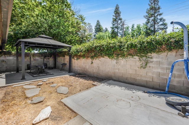 115 Prince Ln, Madera, CA 93637 - fenced backyard with a gazebo and a patio area