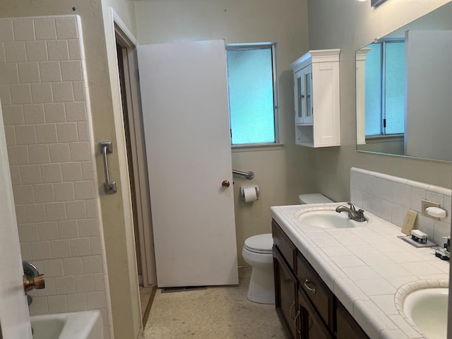 6924 N Winery, Fresno, CA 93710 - bathroom featuring double vanity, tasteful backsplash, and bathtub / shower combination
