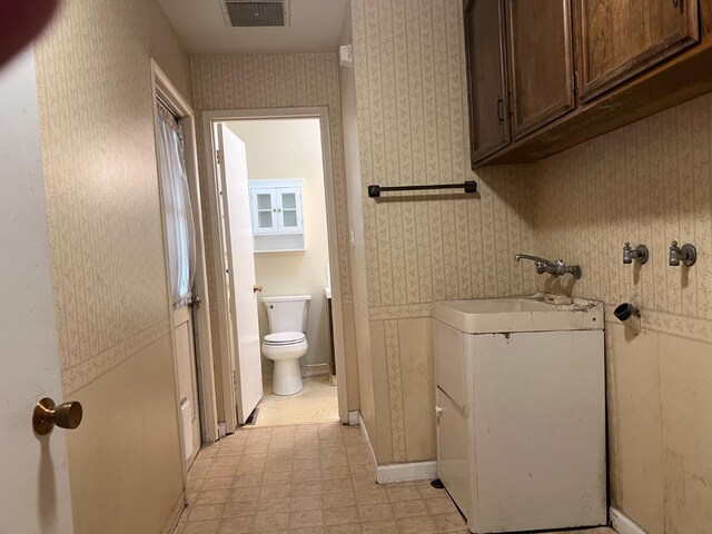6924 N Winery, Fresno, CA 93710 - bathroom featuring tile patterned floors, vanity, and wallpapered walls