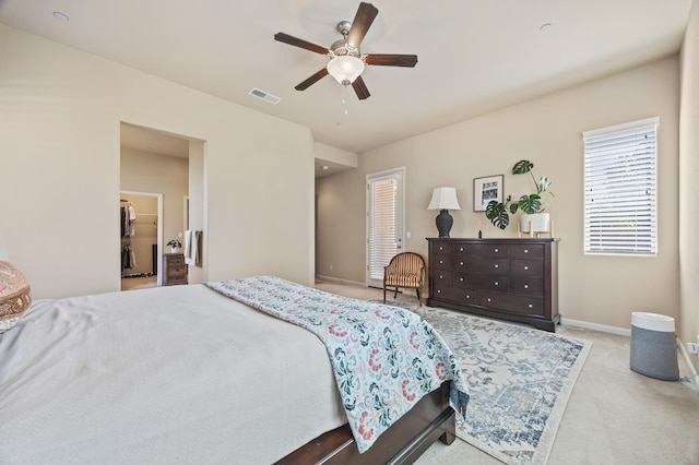 10911 E Swift Ave, Clovis, CA 93619 - carpeted bedroom with ceiling fan and baseboards