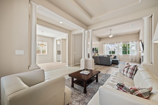 10911 E Swift Ave, Clovis, CA 93619 - living room with ornate columns, ceiling fan, light wood-type flooring, and recessed lighting
