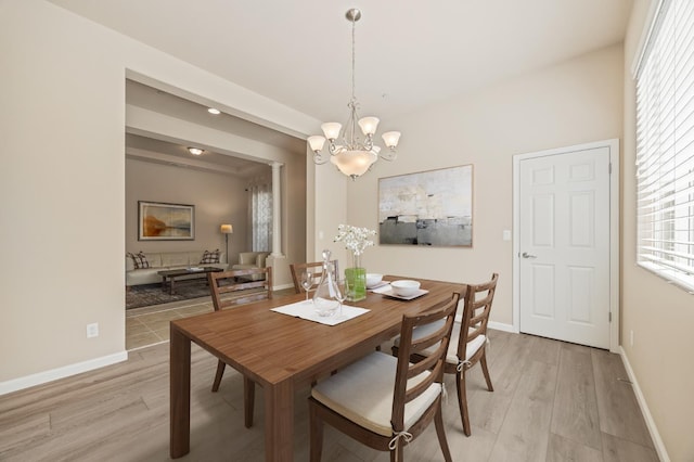 10911 E Swift Ave, Clovis, CA 93619 - dining area featuring light wood-type flooring, plenty of natural light, and a chandelier