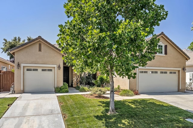 10911 E Swift Ave, Clovis, CA 93619 - view of front of property with concrete driveway, stucco siding, a garage, and a tiled roof