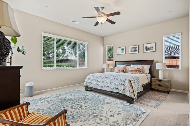 10911 E Swift Ave, Clovis, CA 93619 - bedroom with carpet flooring, multiple windows, and a ceiling fan