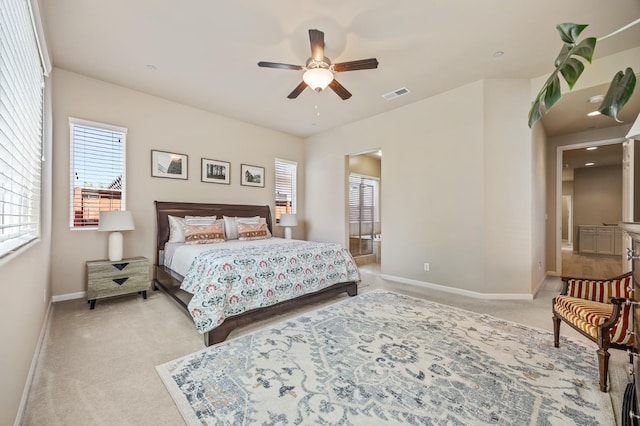 10911 E Swift Ave, Clovis, CA 93619 - bedroom with light carpet, multiple windows, and ceiling fan