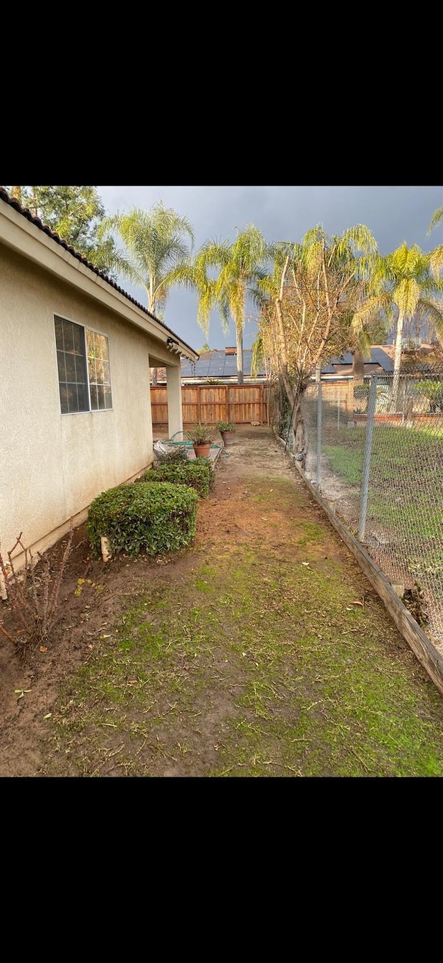 1542 E Alluvial Ave Unit 128, Fresno, CA 93720 - view of fenced backyard