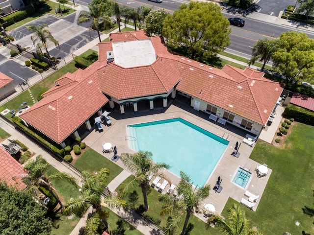 1542 E Alluvial Ave Unit 128, Fresno, CA 93720 - aerial view of property and surrounding area featuring a pool