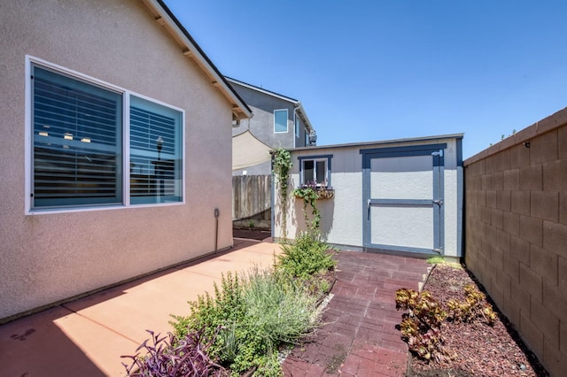 629 Del Monte Ave, Clovis, CA 93619 - fenced backyard featuring a patio area and a shed
