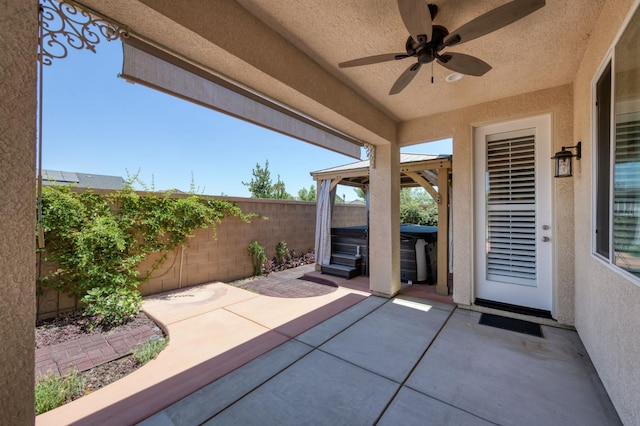 629 Del Monte Ave, Clovis, CA 93619 - fenced backyard with a hot tub, a patio area, and ceiling fan