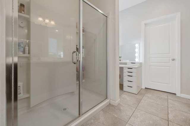 1066 Jade Way, Lemoore, CA 93245 - full bathroom featuring a shower stall, tile patterned flooring, and vanity