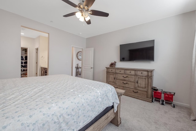 1066 Jade Way, Lemoore, CA 93245 - bedroom with light colored carpet and ceiling fan