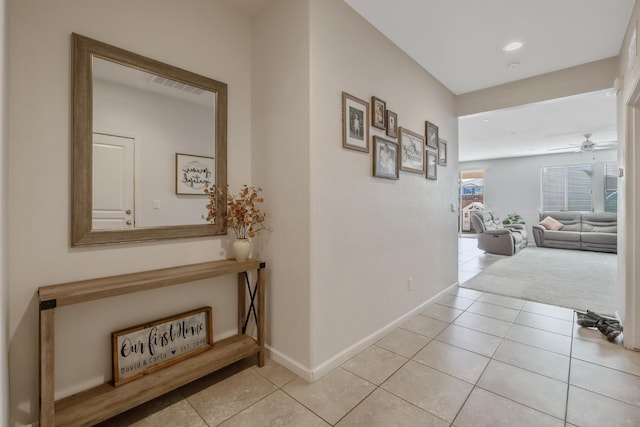1066 Jade Way, Lemoore, CA 93245 - hall with light tile patterned floors and recessed lighting