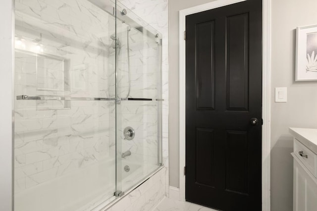 8501 N Akron Ave, Fresno, CA 93720 - full bath with shower / bath combination with glass door, marble finish floors, and vanity