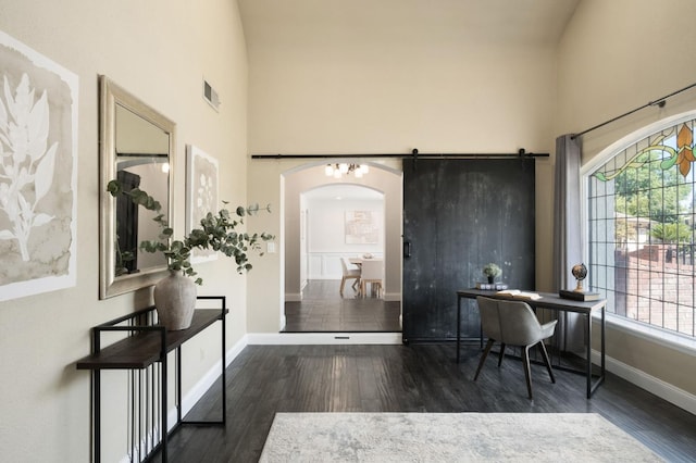8501 N Akron Ave, Fresno, CA 93720 - office featuring a high ceiling, wood finished floors, healthy amount of natural light, and arched walkways