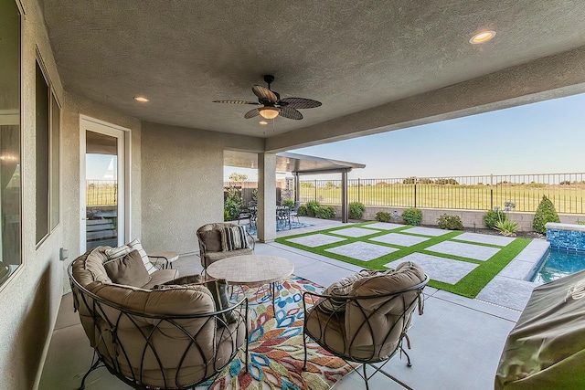 400 Ridge Creek Estates Way, Dinuba, CA 93618 - fenced backyard featuring a patio and a ceiling fan