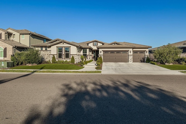 400 Ridge Creek Estates Way, Dinuba, CA 93618 - view of front facade with a residential view, a garage, driveway, stucco siding, and a front lawn