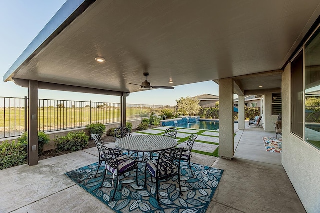 400 Ridge Creek Estates Way, Dinuba, CA 93618 - view of patio featuring outdoor dining area and a ceiling fan
