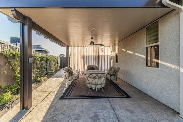 400 Ridge Creek Estates Way, Dinuba, CA 93618 - fenced backyard with ceiling fan and a patio area