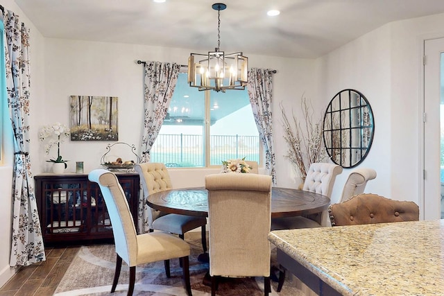 400 Ridge Creek Estates Way, Dinuba, CA 93618 - dining space with dark wood-style flooring, a chandelier, and recessed lighting