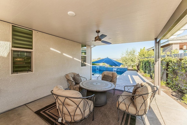 400 Ridge Creek Estates Way, Dinuba, CA 93618 - fenced backyard with a patio, ceiling fan, and an outdoor pool