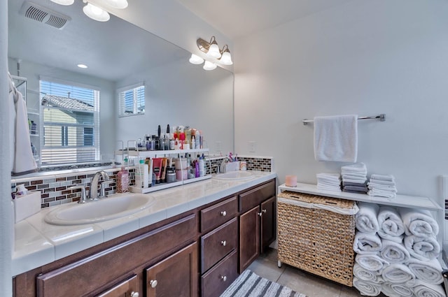 915 Winchell Way W, Madera, CA 93636 - full bath featuring double vanity, backsplash, and tile patterned floors