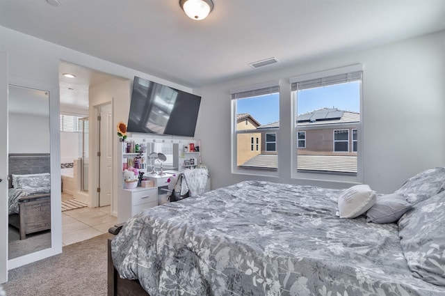 915 Winchell Way W, Madera, CA 93636 - carpeted bedroom with tile patterned flooring