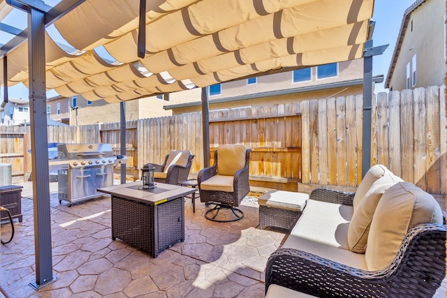 915 Winchell Way W, Madera, CA 93636 - view of patio with a grill, a pergola, and an outdoor living space