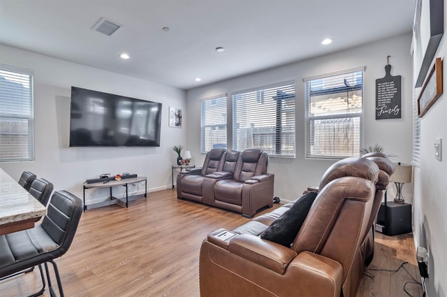 915 Winchell Way W, Madera, CA 93636 - living area featuring light wood-style flooring and recessed lighting